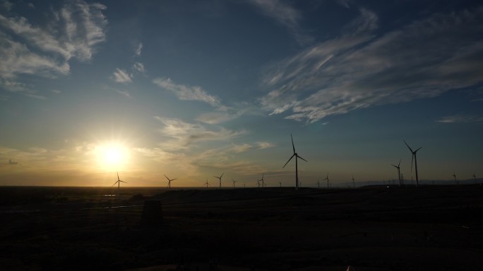 新疆 五彩滩 景 落日 风车 夕阳