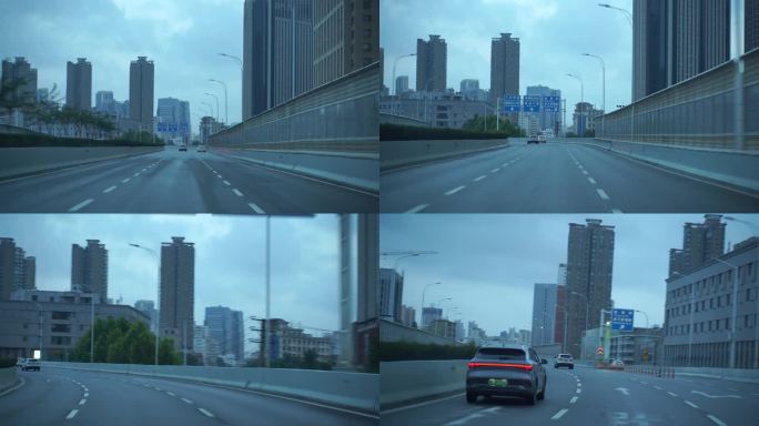 城市道路车窗外风景汽车行驶移动建筑风光