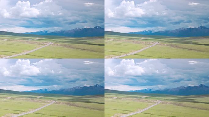 西藏那曲雪山草原上的青藏公铁三路并行航拍