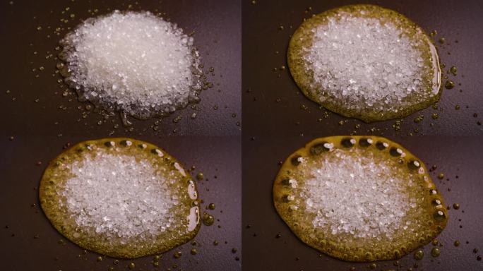 白砂糖颗粒在锅里融化变成焦糖
