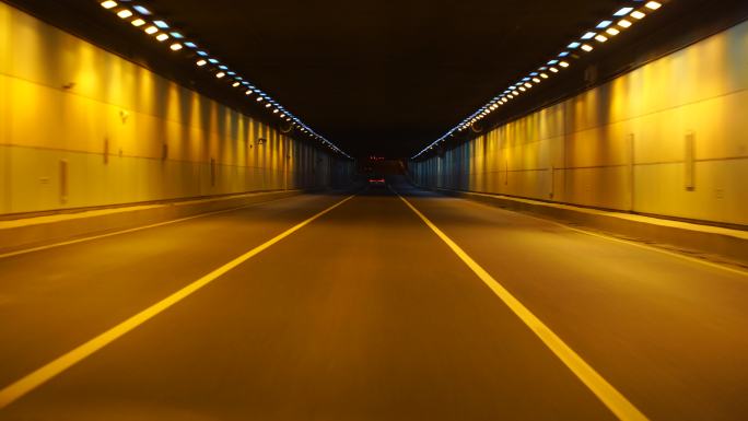 夜间开车行驶在城市道路夜晚城市车窗外风景