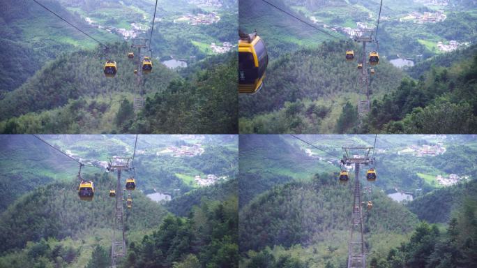 乘坐缆车景区索道观光缆车特写森林山上风景