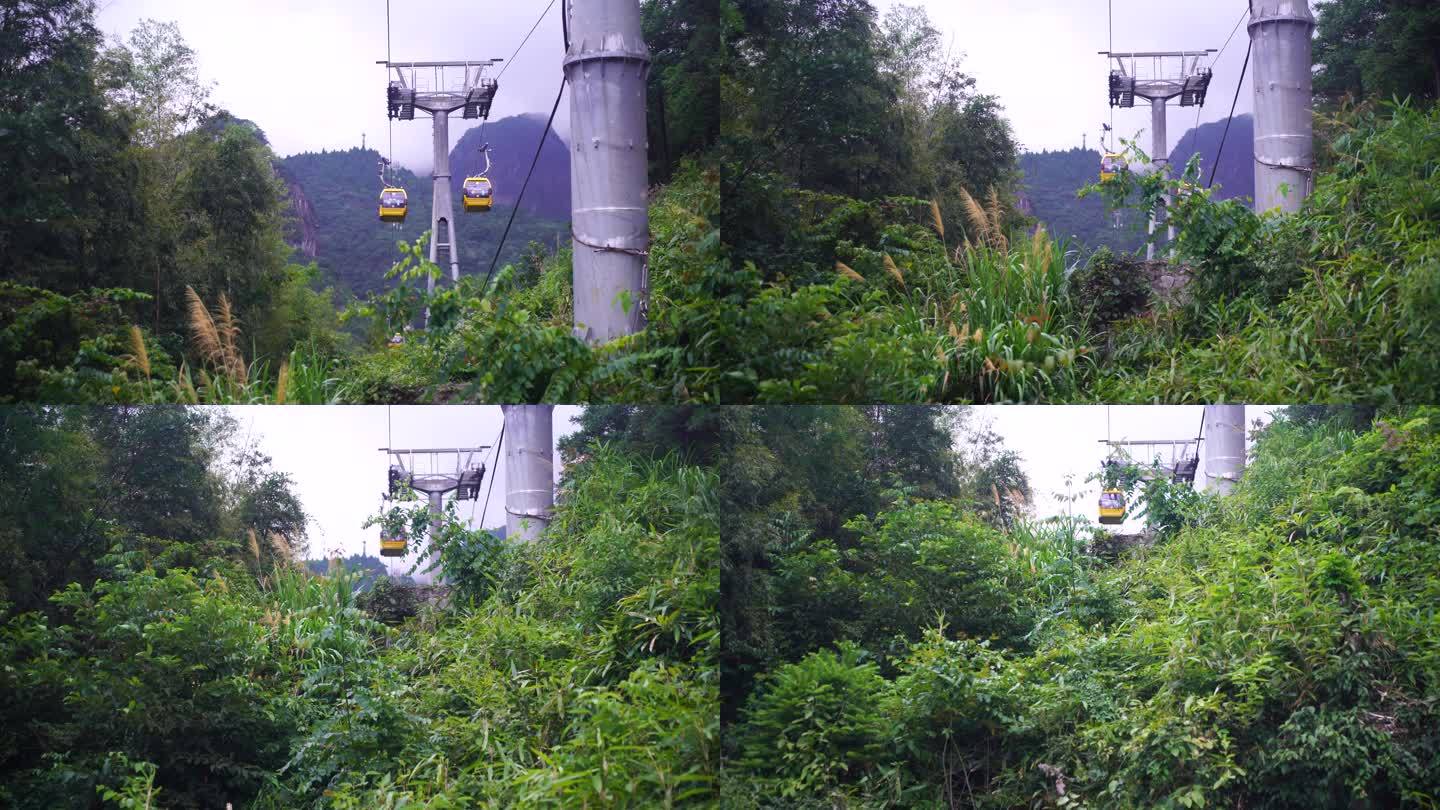 乘坐缆车景区索道观光缆车特写森林山上风景