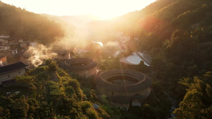 福建龙岩永定初溪土楼群日落航拍空镜