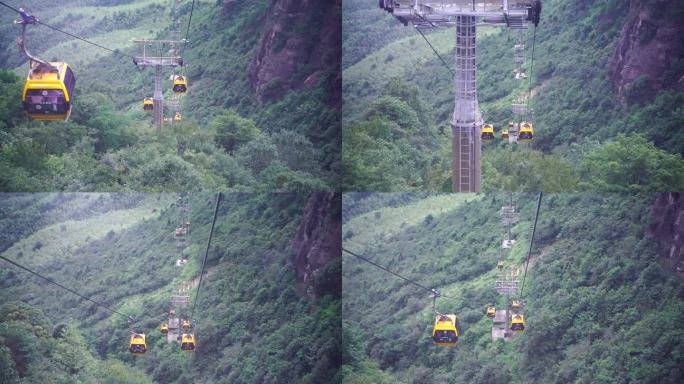 乘坐缆车景区索道观光缆车特写森林山上风景