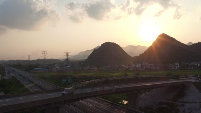 航拍日落下的桂林高速公路立交桥