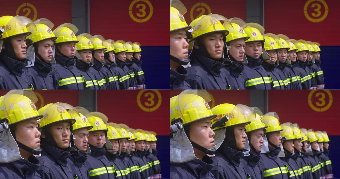正在集合队伍的全副武装的消防员战士