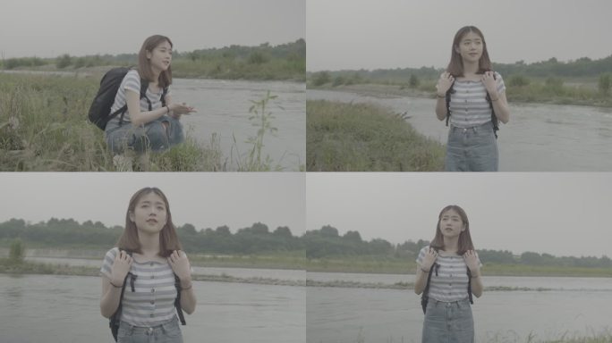 女孩乡村河边玩水欣赏田间风景灰片