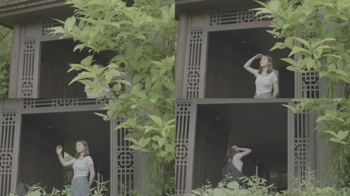 女孩在田园小息惬意欣赏中式园林风景灰片