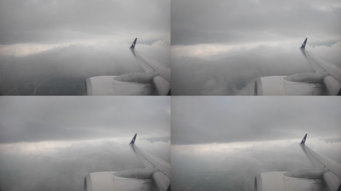 透过飞机窗户拍摄飞行高度的空中和地面景色