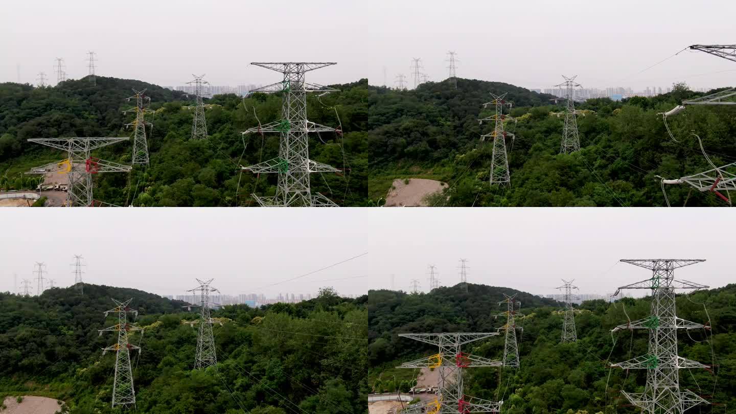 航拍山上电力系统高架电塔
