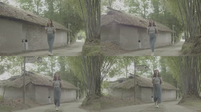 女孩漫步竹林欣赏古老乡村田间风景灰片