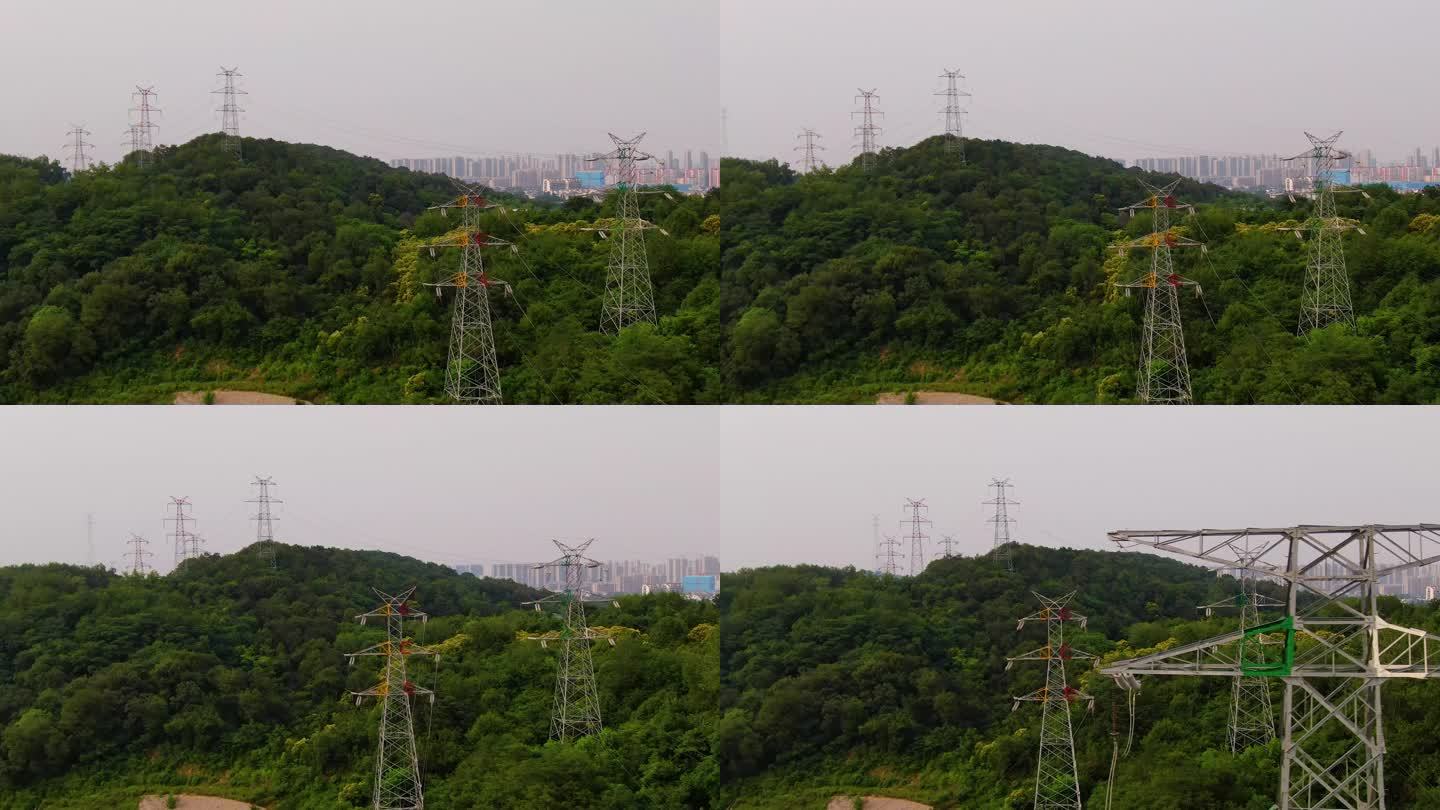 航拍山上电力系统高架电塔