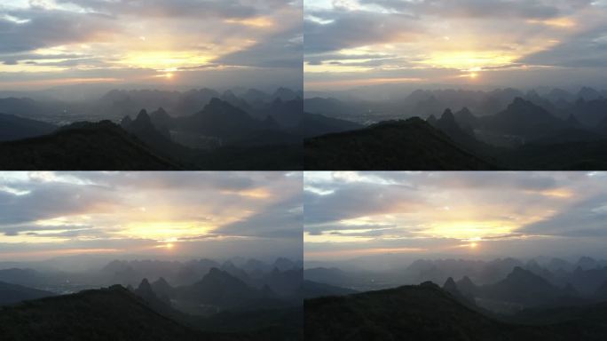 航拍日出时分桂林的山和山谷中的雾
