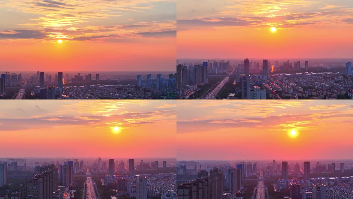 航拍枣庄市新城区光明路两端夕阳下高层建筑