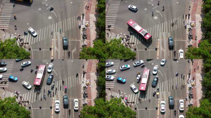 航拍斑马线过马路车来车往的十字路口