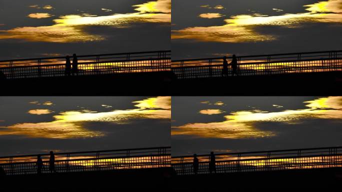 落日余晖下天桥上的行人升格镜头