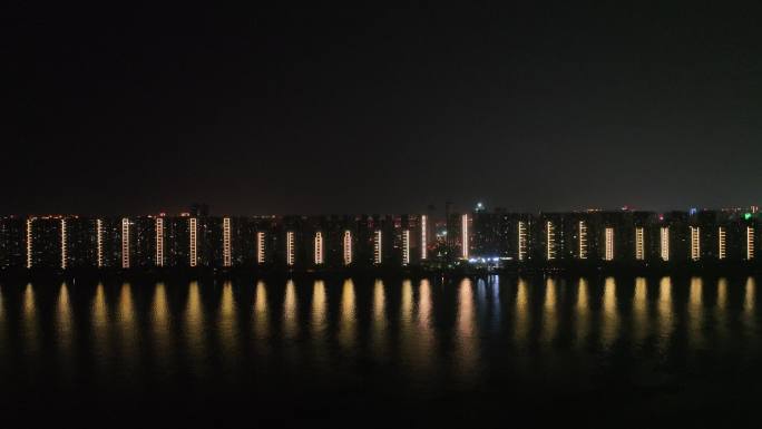 江滨小区夜景风光湖边社区居民楼建筑夜景