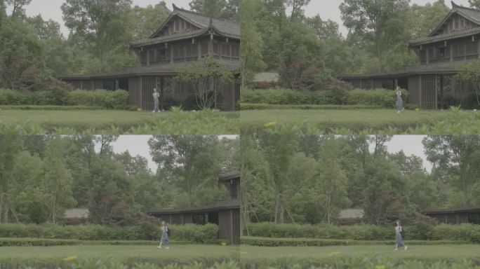 女孩从古建走出欣赏中式建筑田园风景灰片