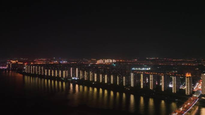 江滨小区夜景风光湖边社区居民楼建筑夜景