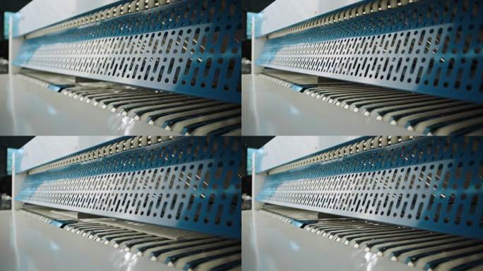 洗涤工厂布草床单自动化熨烫折叠机器运作