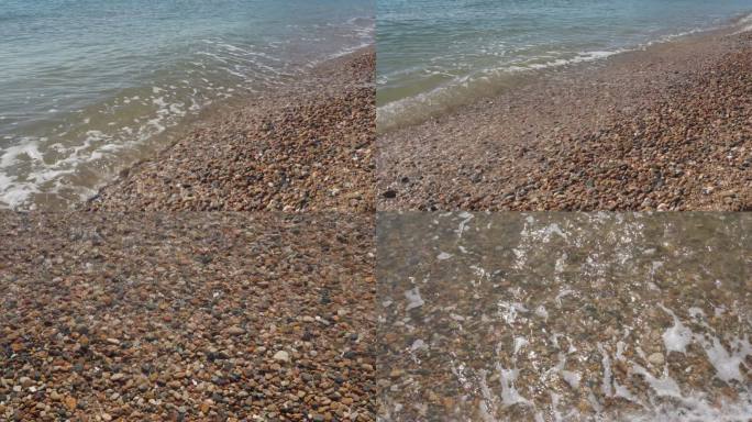 实拍4K海水冲刷海滩石头视频素材