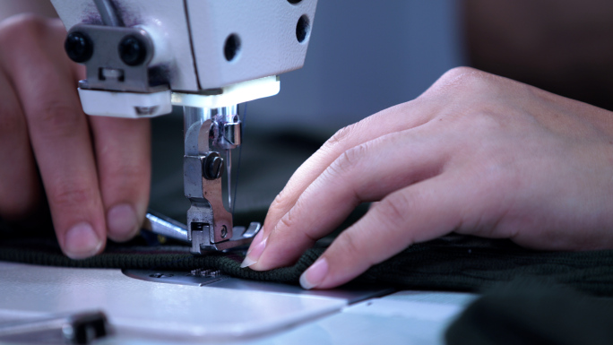 机器缝衣服，缝纫机，订标，服装厂，做衣服