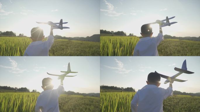 欢乐童年儿童节小男孩男装飞机模型逆光奔跑