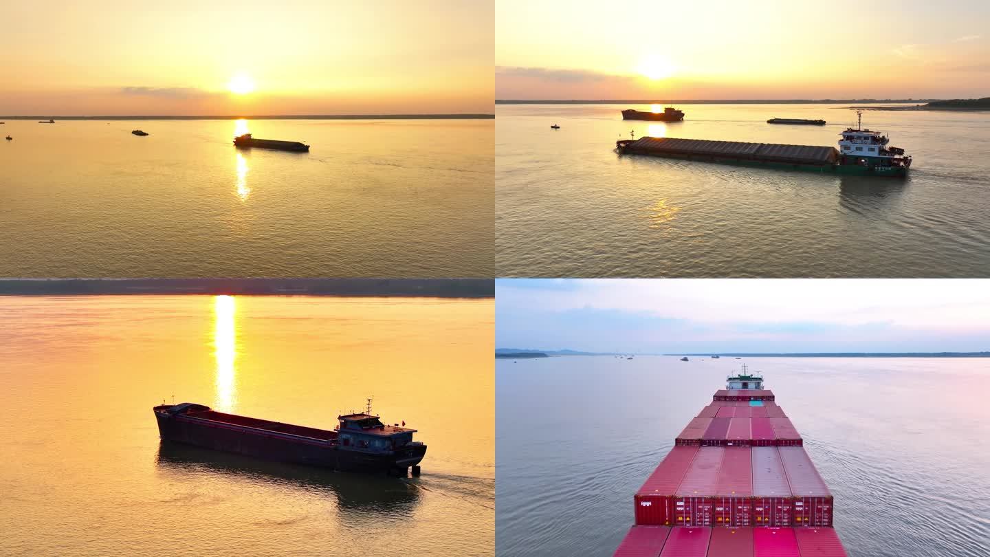 夕阳长江行驶货运的货轮船只