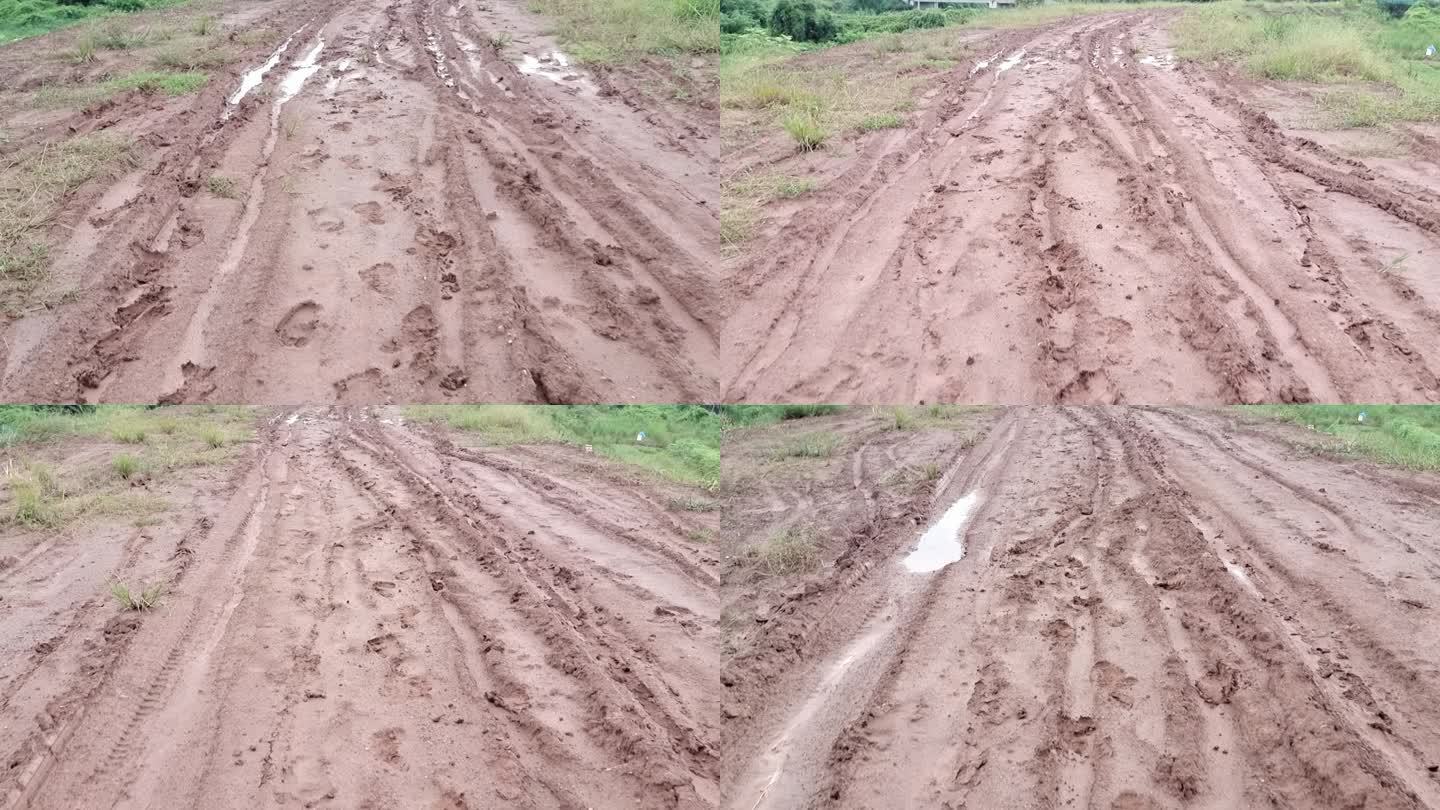 农村泥泞路下雨后积水路面黄土泥路实拍素材