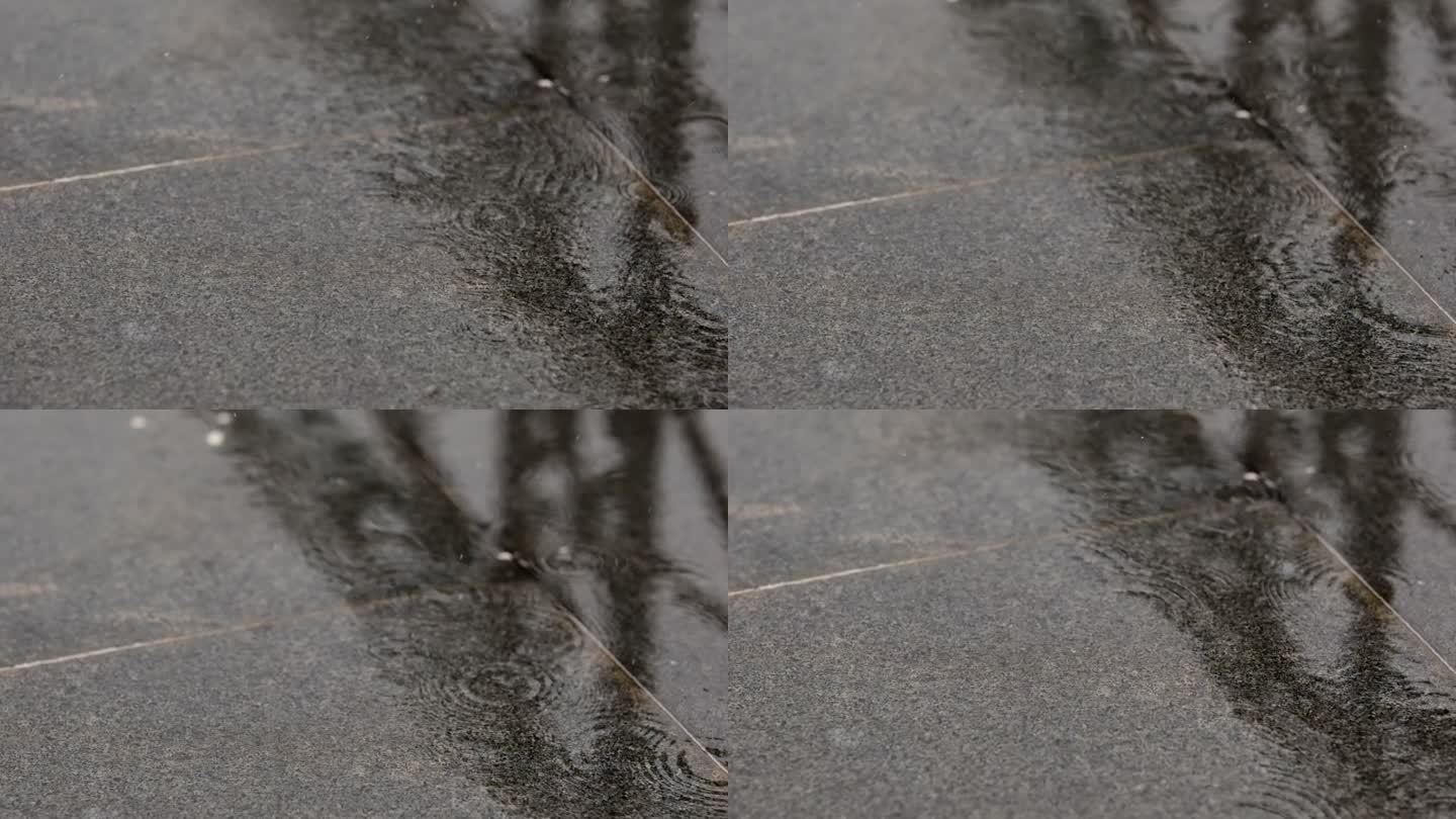 下雨的雨水打在地面时溅起的水花慢动作