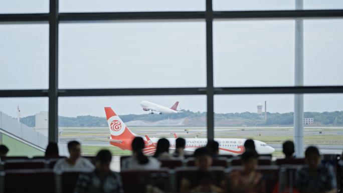 飞机起飞从窗户视角剪影跑道滑行吉祥航空