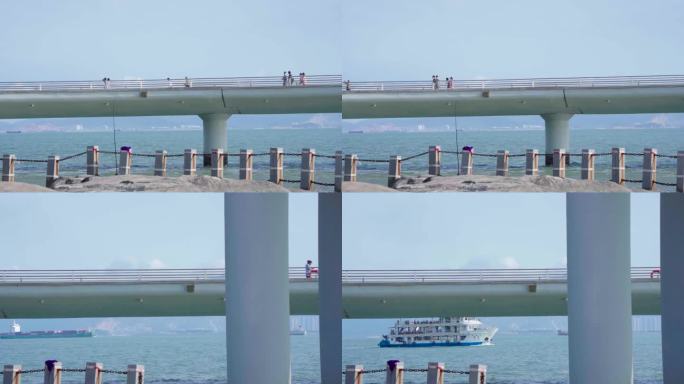 观景桥海景桥观景平台桥下的游船客船游轮