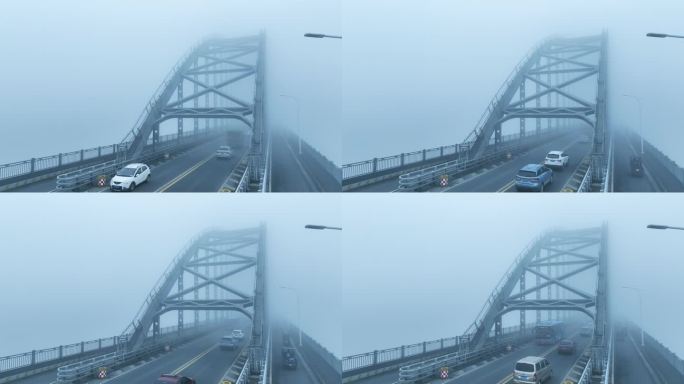 航拍大雾中的九江长江大桥