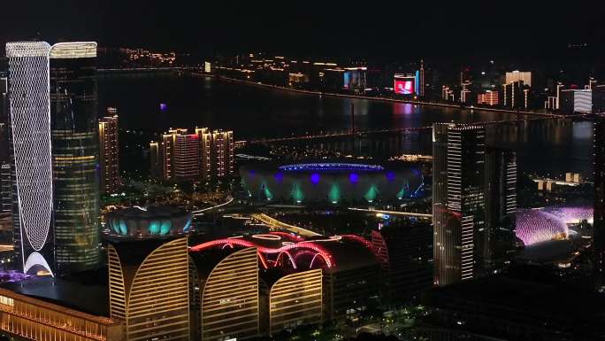 航拍杭州钱塘江两岸杭州之门大小莲花夜景