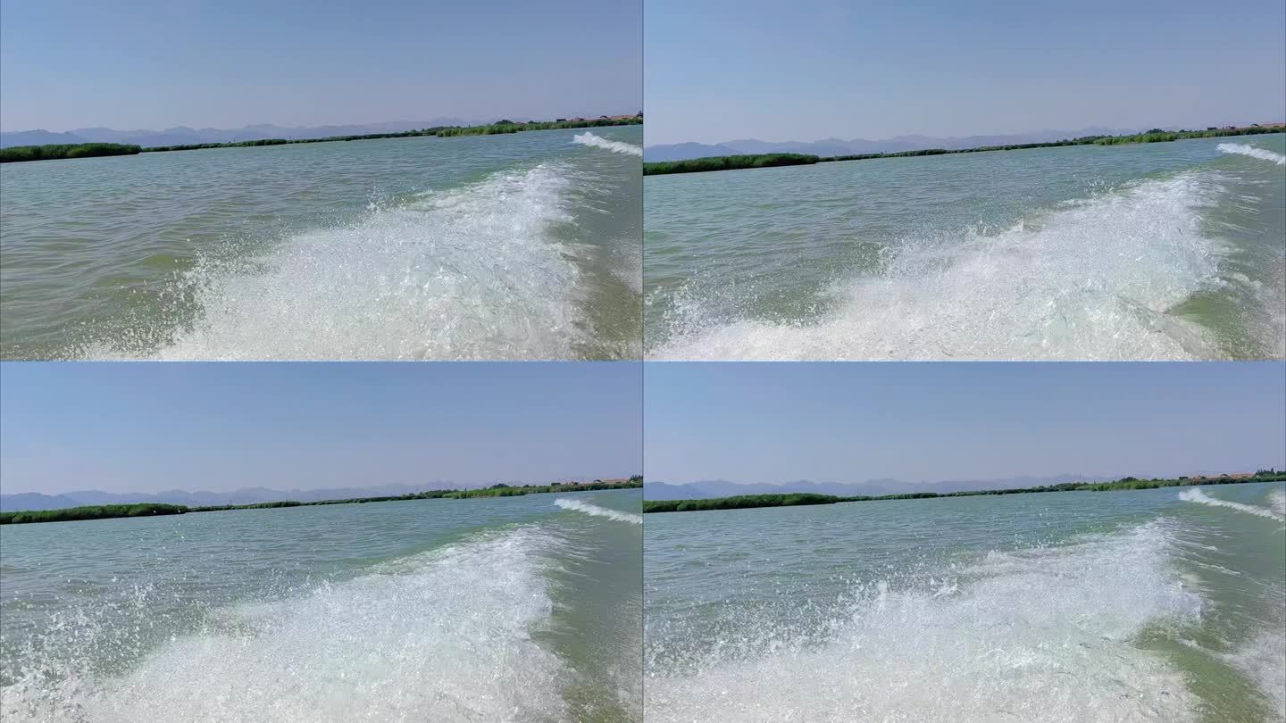 宁夏石嘴山沙湖旅游区快艇掀起的波浪