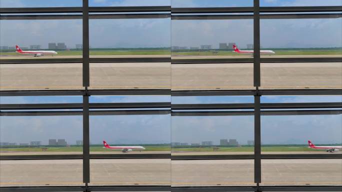 厦门高崎国际机场航站楼外滑行的飞机航班