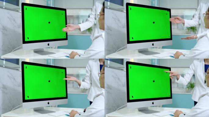 一台绿色屏幕的电脑 绿幕抠像电脑 扣像