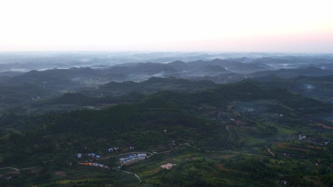 航拍盆地傍晚山峦叠嶂