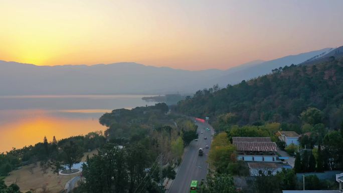 凉山西昌听涛小镇海滨南路邛海湾日出航拍