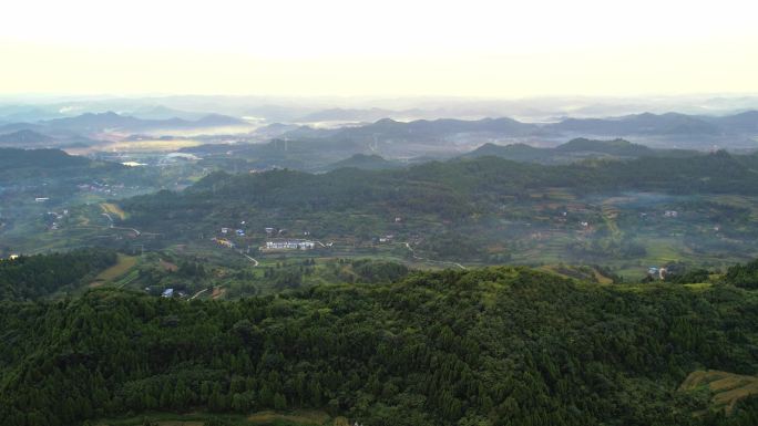 航拍农村清晨山峦叠嶂