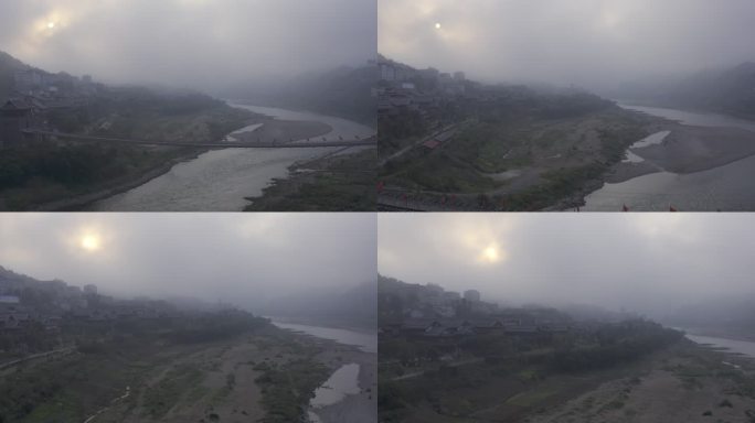 大山里清晨雾气中的古村落