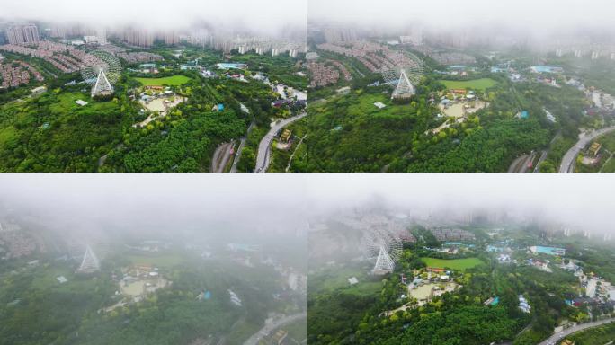 雨雾中南宁凤岭儿童公园航拍4K摩天轮