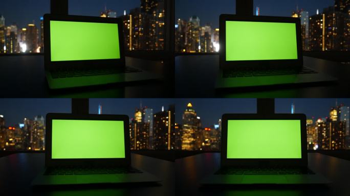 带有绿色屏幕的笔记本电脑