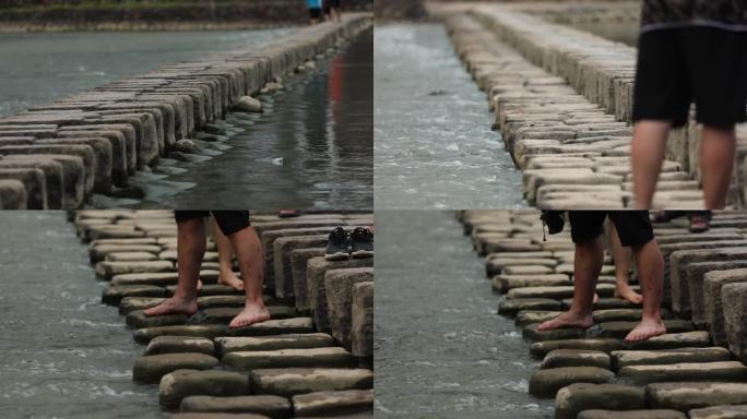 浙江温州泰顺县行人走过仕水碇步