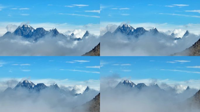 航拍云雾中的四川阿坝巴朗山垭口雪山群峰