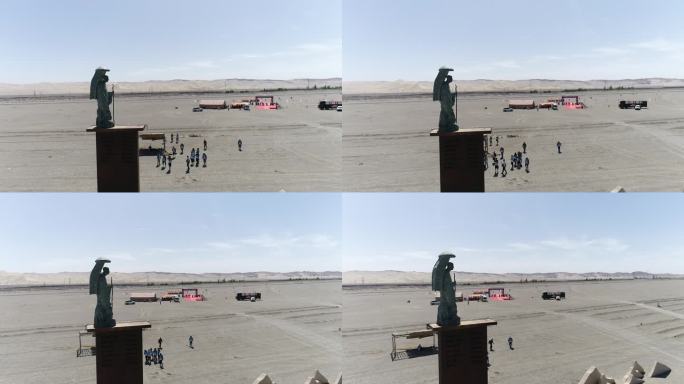 航拍敦煌千人戈壁沙漠徒步航拍玄奘之路雕像