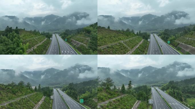 森林公路航拍雨后森林高速公路树林云雾风景