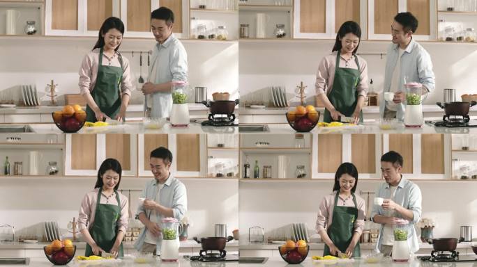 一对年轻的亚洲夫妇在家里厨房做饭的时候聊天