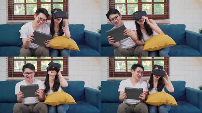 亚洲夫妇使用平板电脑和虚拟现实模拟器在客厅里玩游戏，情侣们开心地坐在家里的桌子上。生活方式家庭放松在